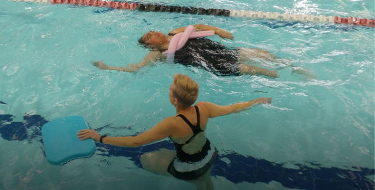 Ladies swimming in a pool